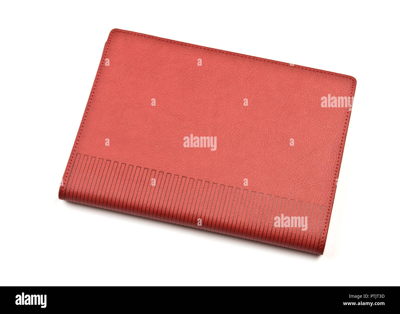 Red-brown notebook on white background. Stock Photo
