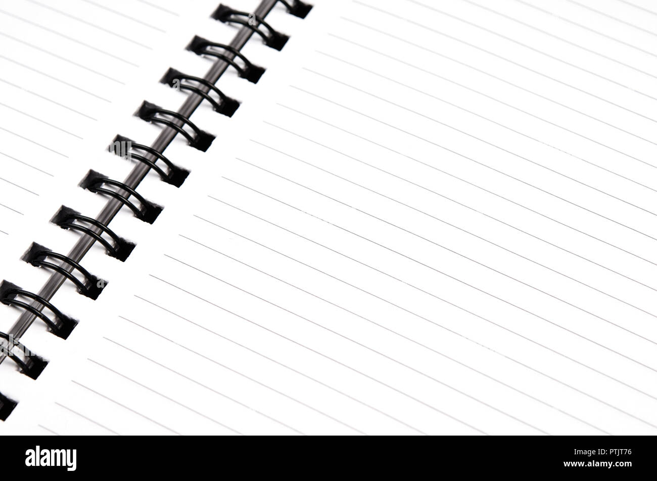 An open spiral notebook with blank pages Stock Photo Alamy
