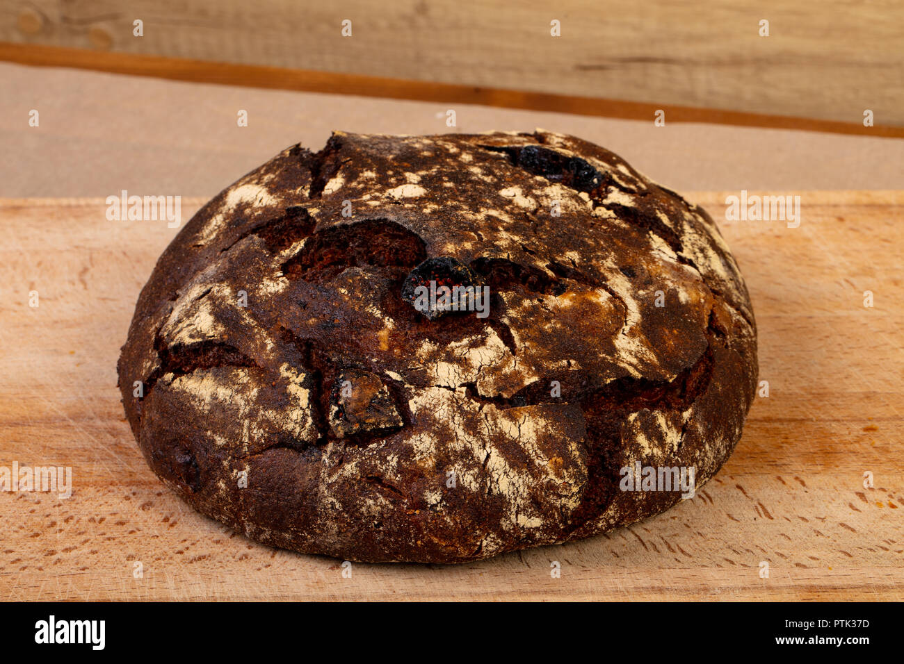 Homemade tasty bread over wooden background Stock Photo - Alamy