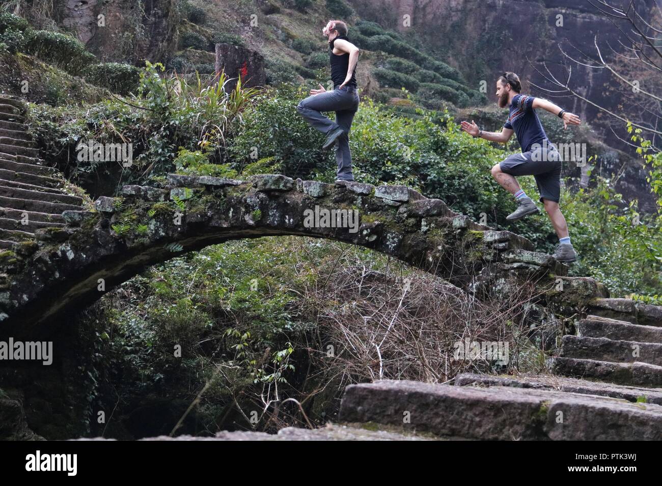 European couple doing Sport, running hiking in China. Stock Photo