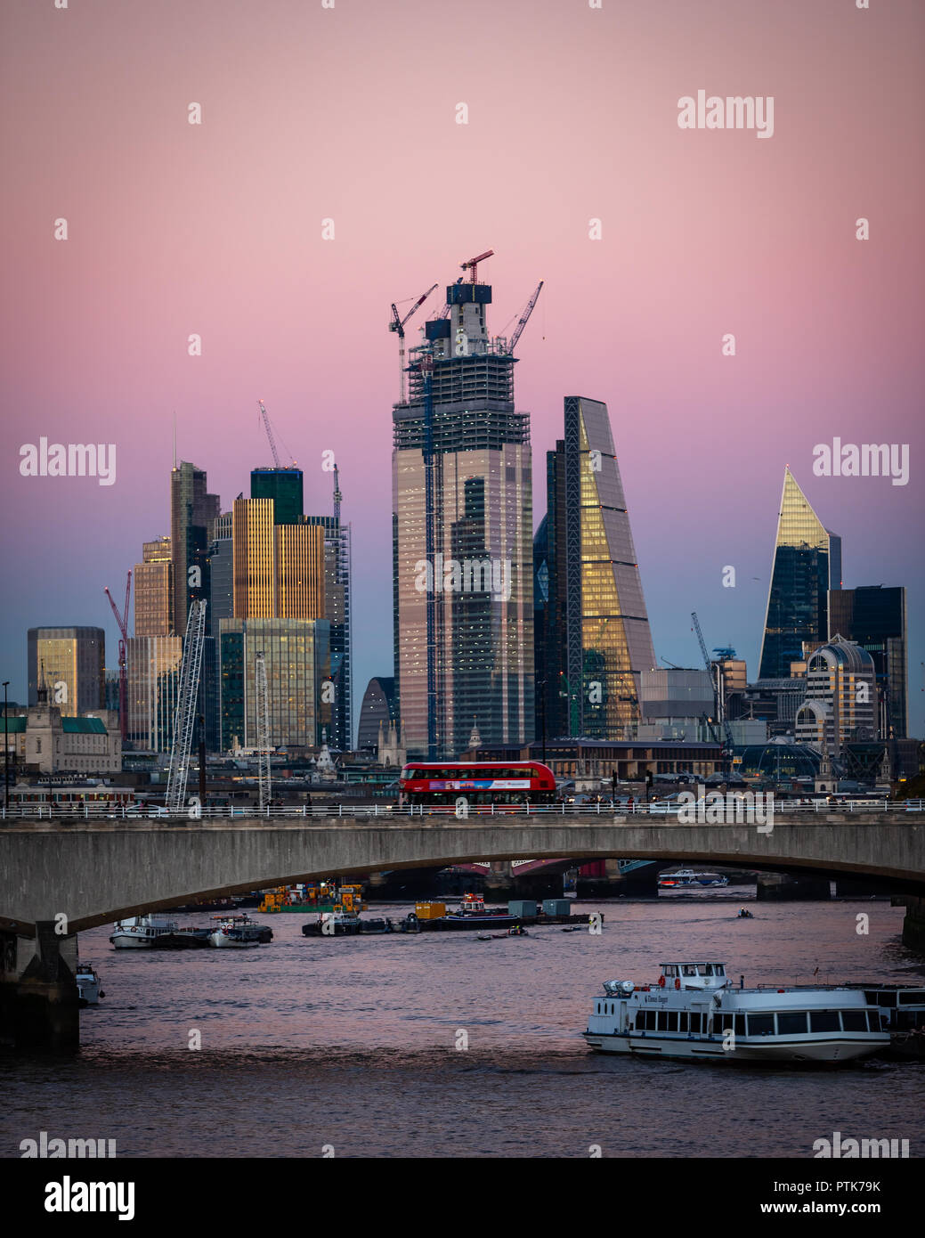 The London skyline with a pink sky Stock Photo