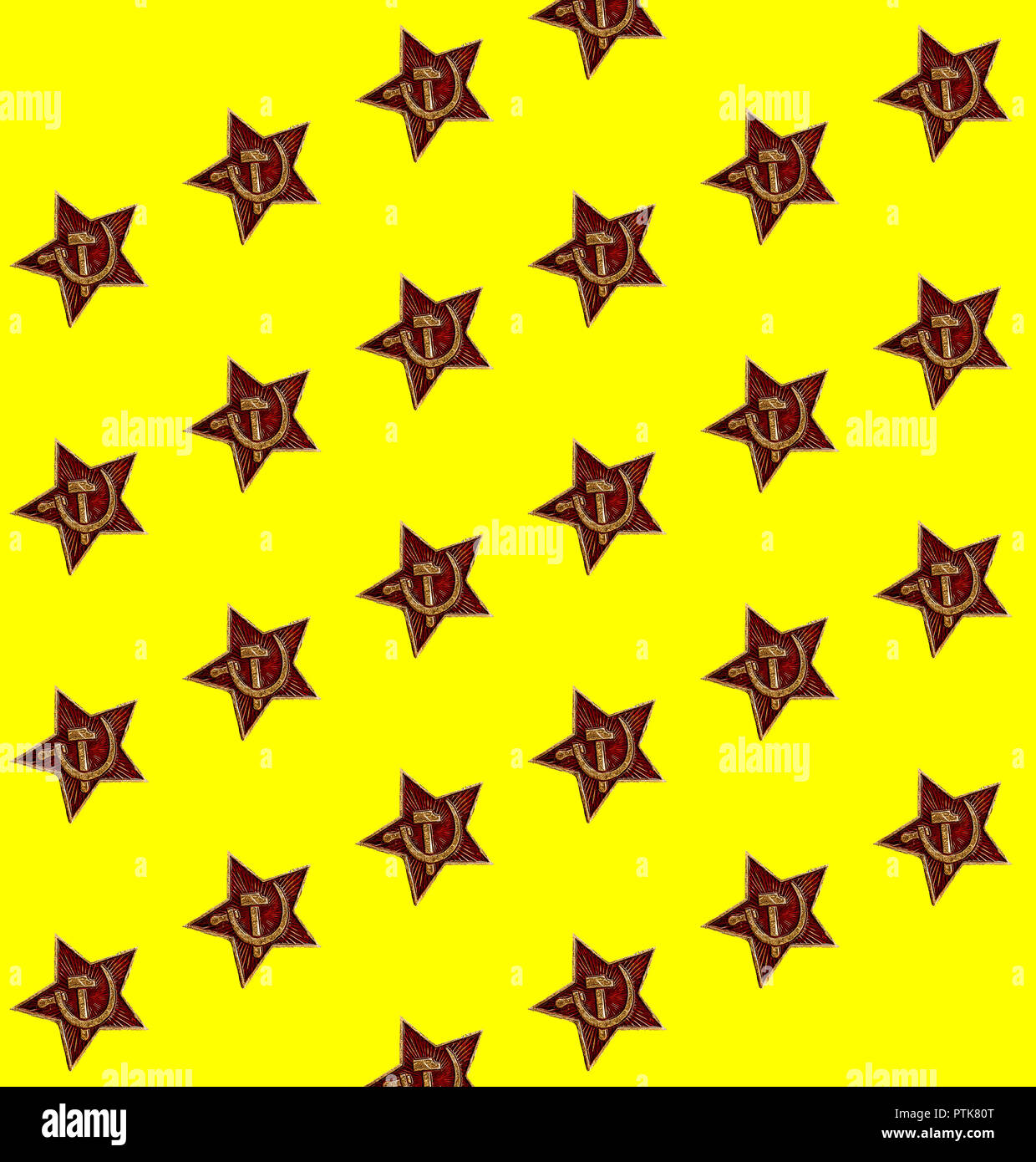Seamless pattern of red star with hammer and sickle on the yellow background Stock Photo