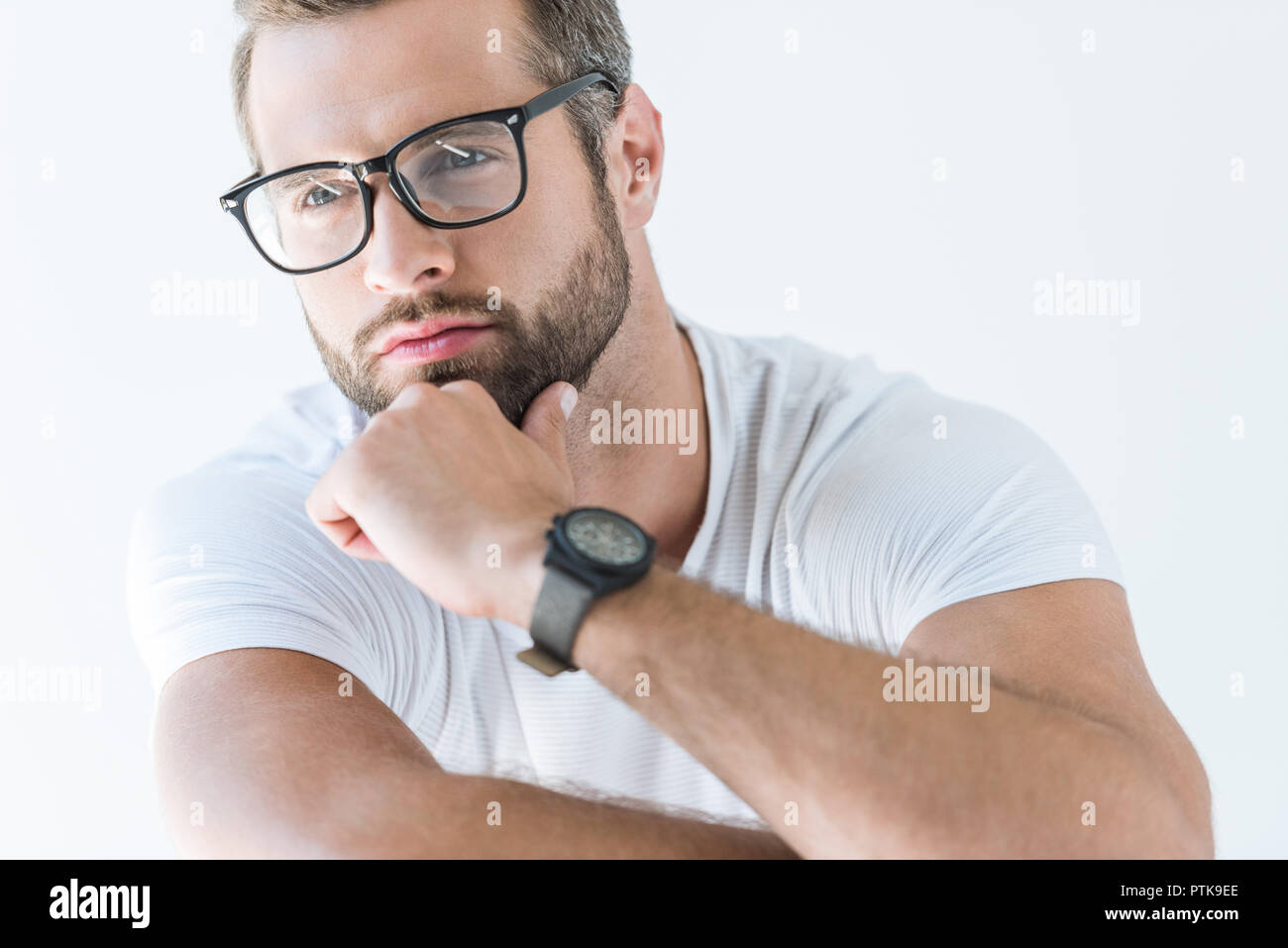 handsome thoughtful man in eyeglasses, isolated on white Stock Photo