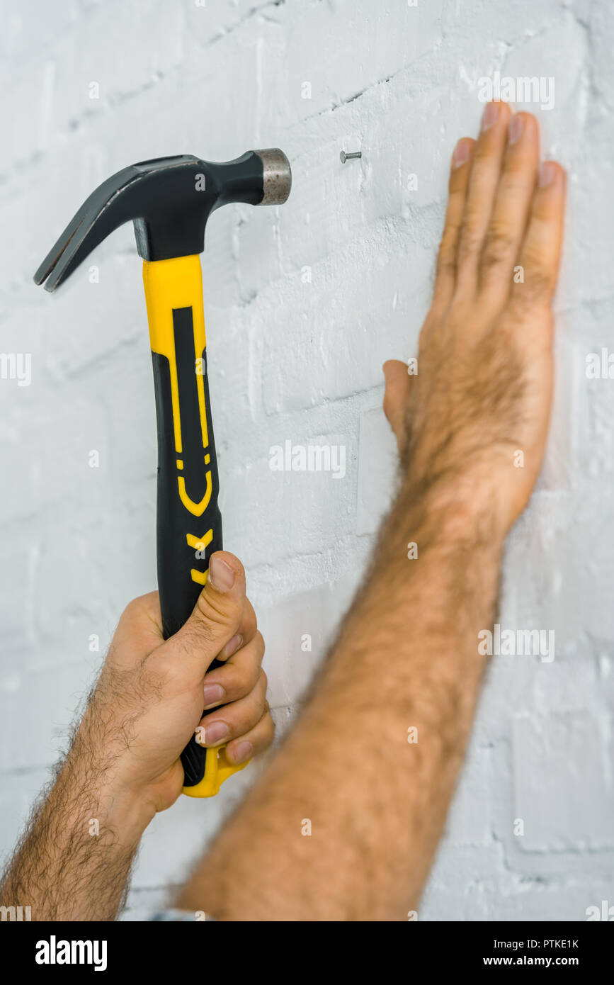 Nail in the wall hires stock photography and images Alamy