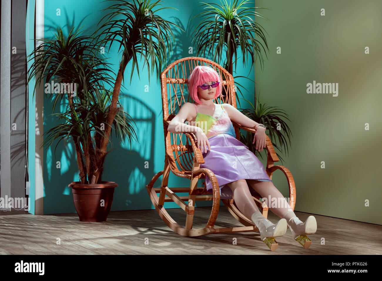 Girl sitting in rocking chair hi-res stock photography and images - Alamy