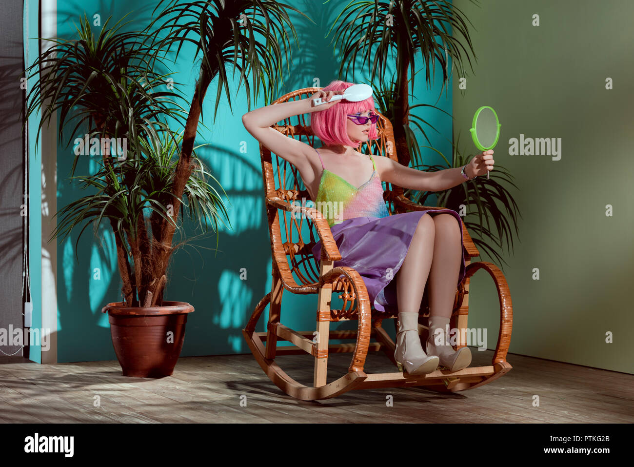 Girl sitting in rocking chair hi-res stock photography and images - Alamy