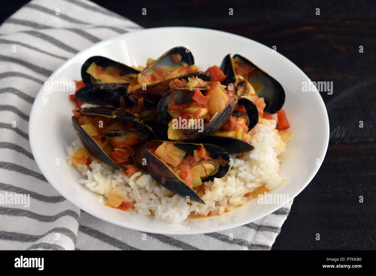 Tanzanian Style Mussel Curry with Rice Stock Photo Alamy