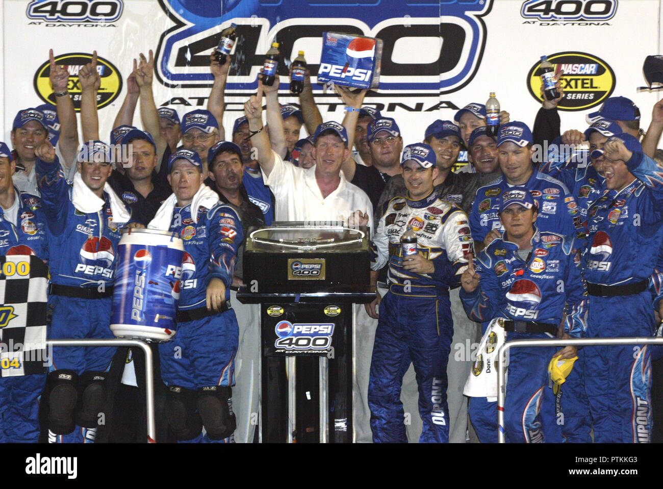 Jeff Gordon celebrates winning the NASCAR Nextel Cup Pepsi 400, at