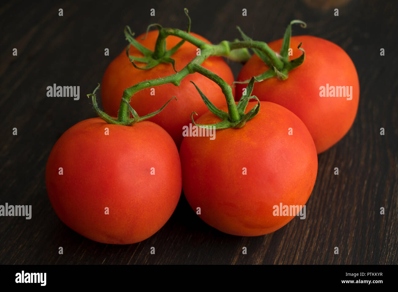 Tomatoes on the Vine Stock Photo