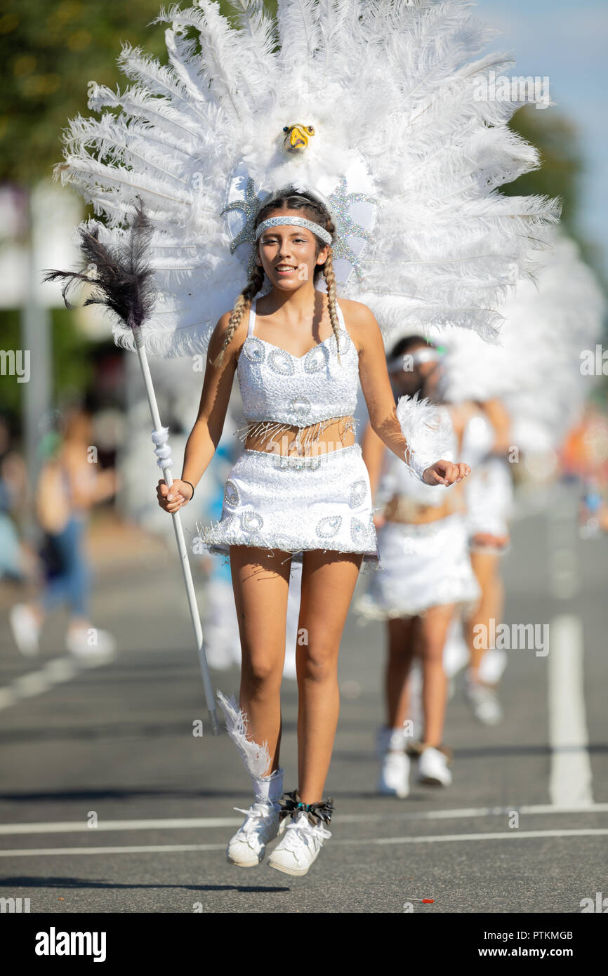 Washington, D.C., USA - September 29, 2018: The Fiesta DC Parade, Woman from bolivia wearing traditional clothing with headwear in shape of an eagle w Stock Photo