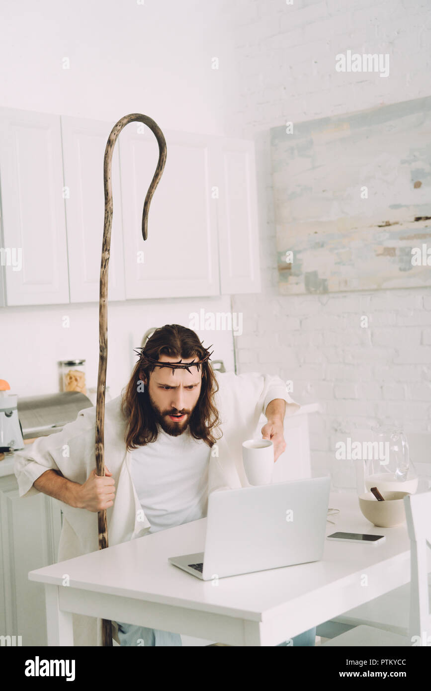 Jesus Complaining Computer Jesus looking at laptop hi-res stock photography and images - Alamy