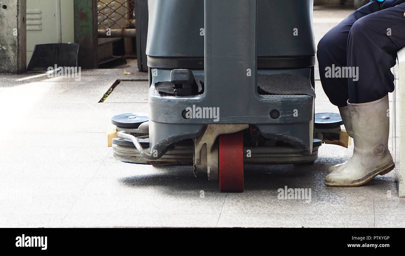 Industrial floor scrubber. Scrubber for cleaning and maintenance