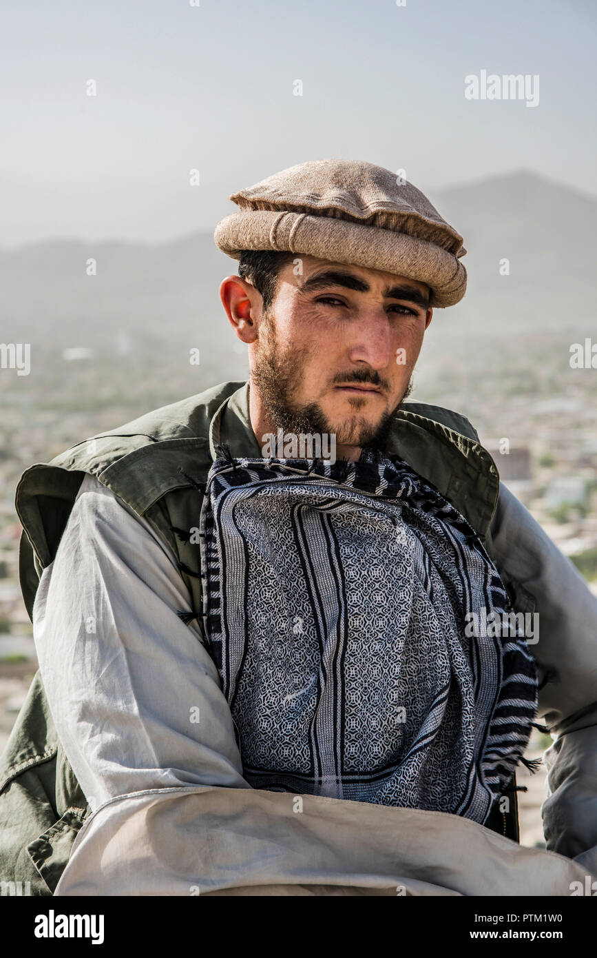A local Afghan man a the top of swimming pool hill in Kabul in Afghanistan. Stock Photo