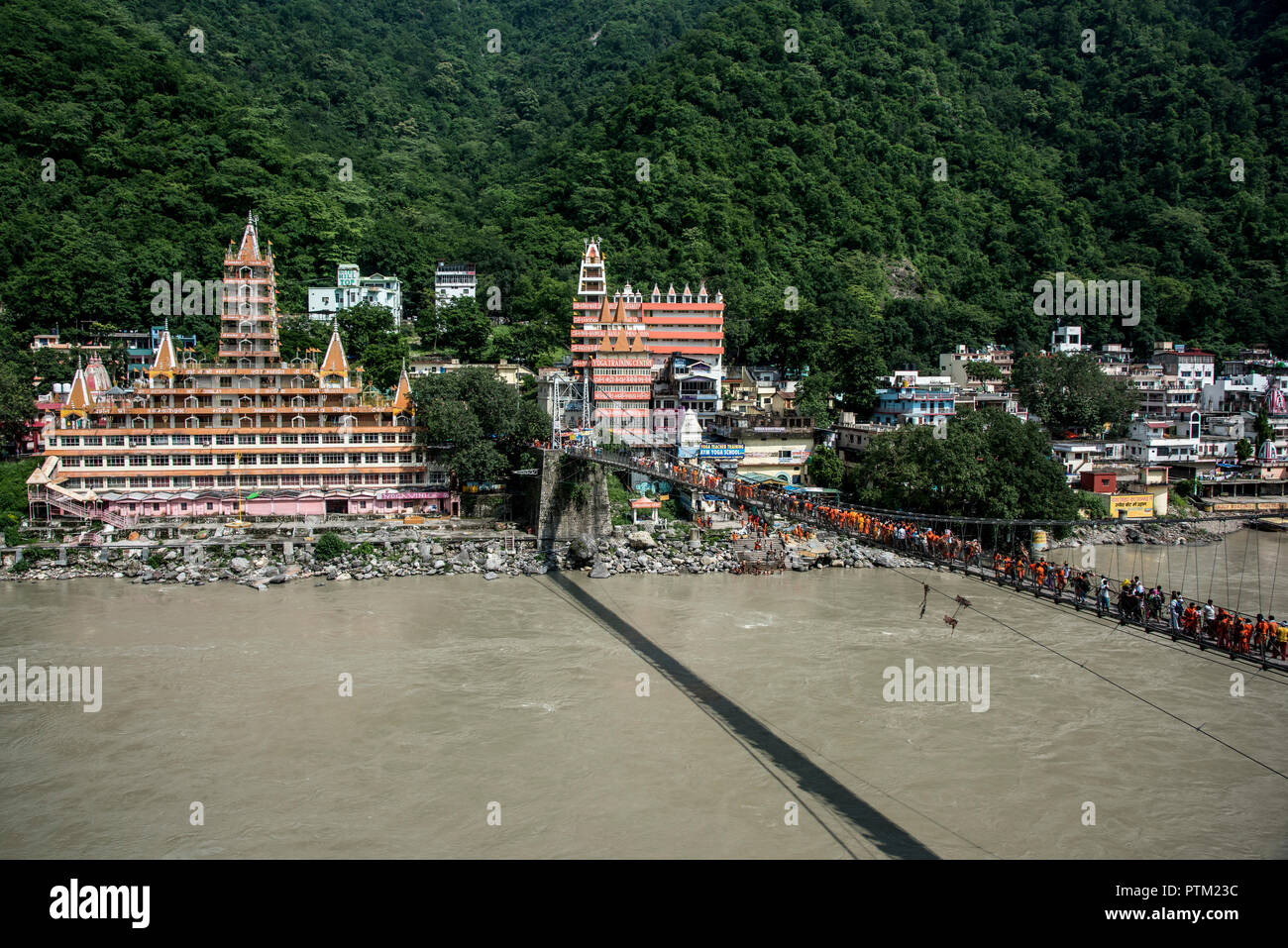 Laxhman Jula bridge spanning over the River Ganges in Rishikesh in India. Stock Photo