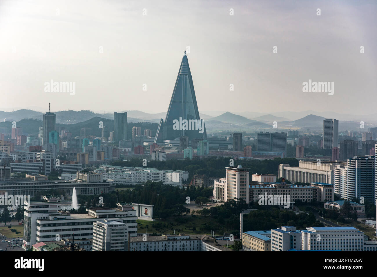 Views of the Ryugyong Hotel and Pyongyang City taken from the Juche Tower in North Korea. Stock Photo