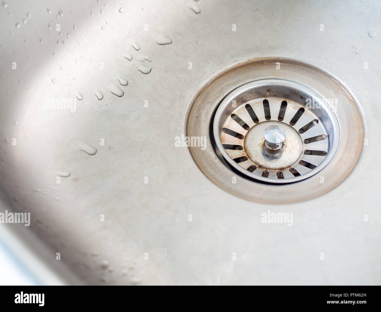 Dirty Stainless Steel Kitchen Sink Drain With Water Stain