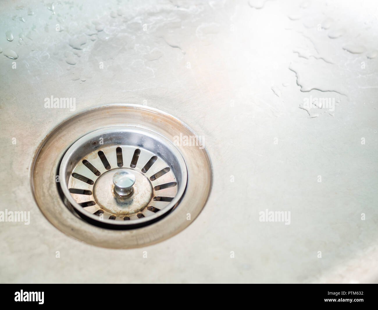 Dirty Stainless Steel Kitchen Sink Drain With Water Stain
