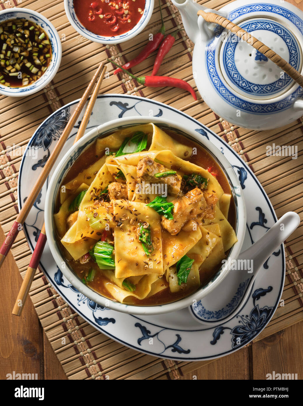 Biang biang noodles. Spicy regional Chinese food Stock Photo - Alamy