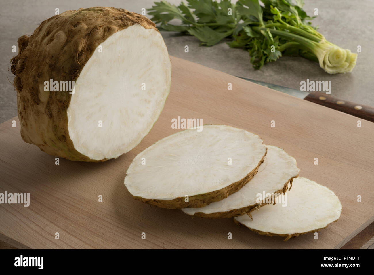 Fresh raw organic celery root and slices closeup Stock Photo