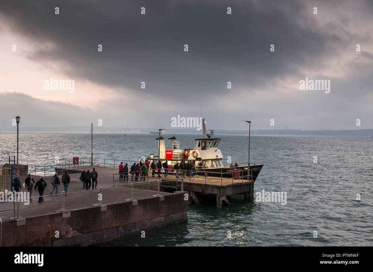 Cobh, Cork, Ireland. 10th October, 2018.  Naval personel prepare to board the ferry Karycraft at the naval pier in Cobh that will transport the to  the Naval Base at Haulbowline, Co. Cork Ireland. Credit: David Creedon/Alamy Live News Stock Photo