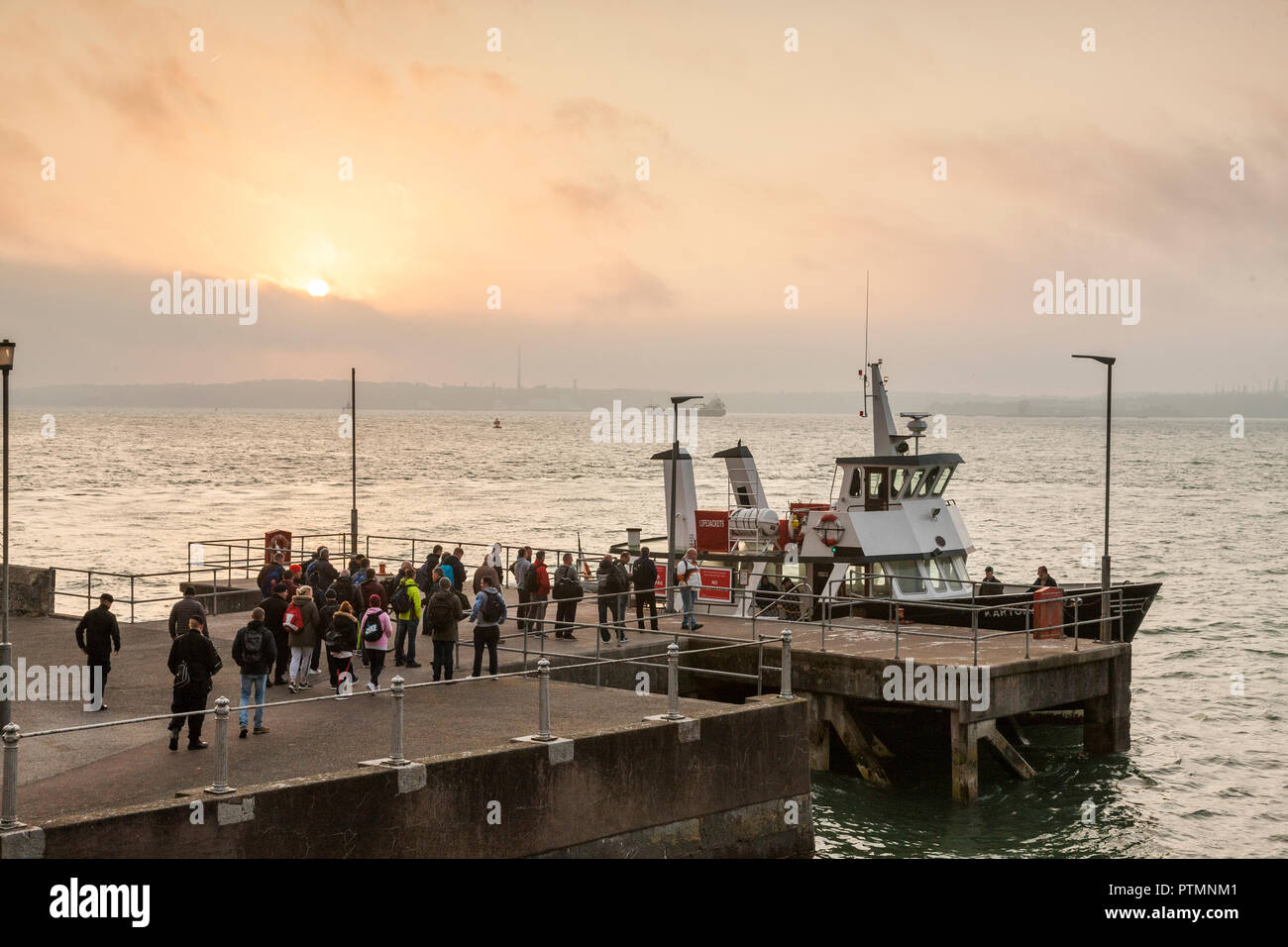 Cobh, Cork, Ireland. 10th October, 2018.  Naval personel prepare to board the ferry Karycraft at the naval pier in Cobh that will transport the to  the Naval Base at Haulbowline, Co. Cork Ireland. Credit: David Creedon/Alamy Live News Stock Photo