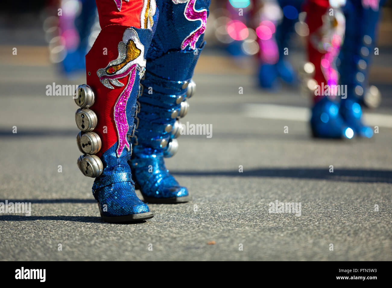 Washington, D.C., USA - September 29, 2018: The Fiesta DC Parade, Bolivian men wearing traditional clothing performing a traditional Bolivian dance Stock Photo