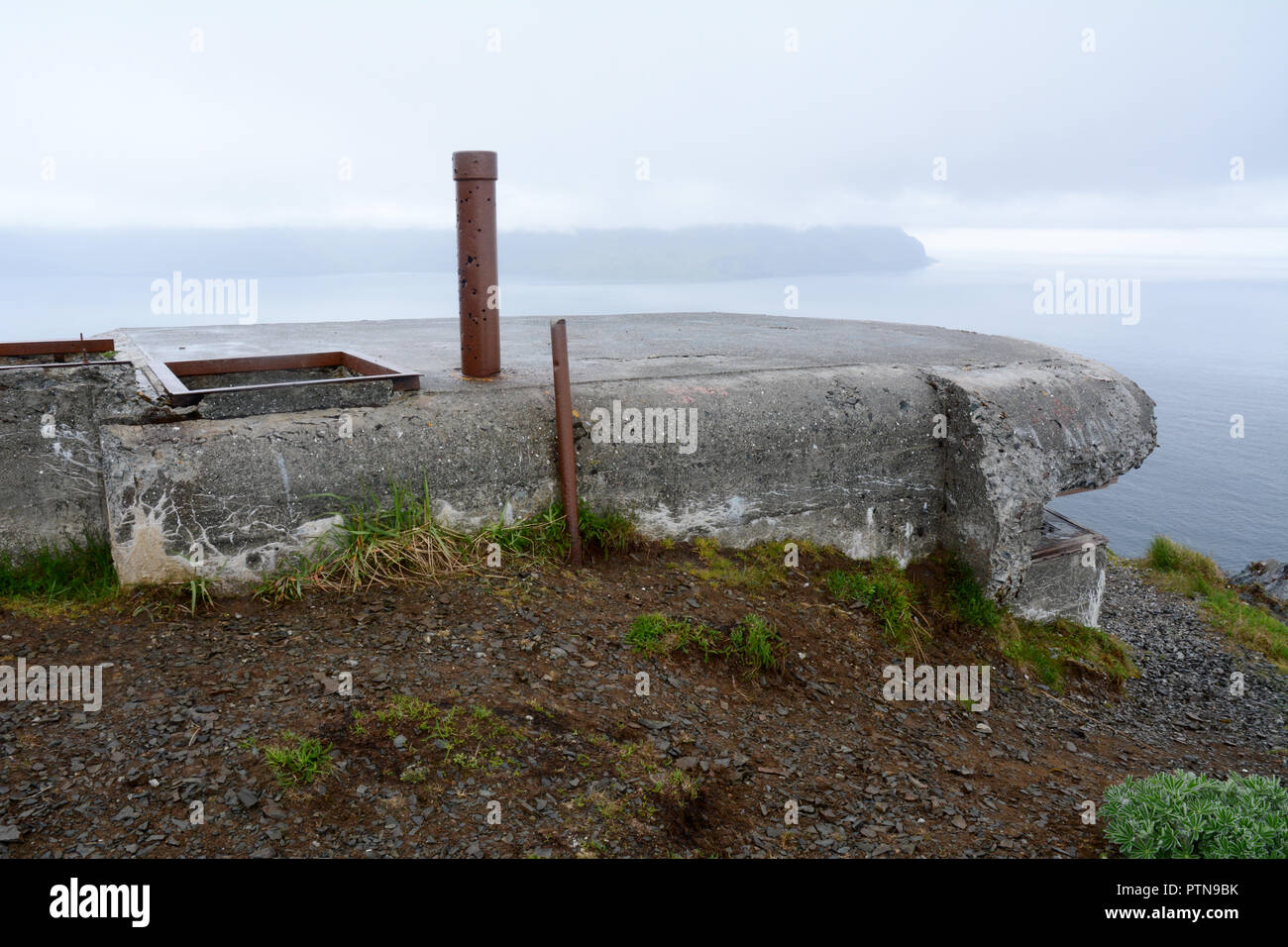 An abandoned World War Two U.S. military bunker and observation point at Fort Schwatka on Mount Ballyhoo, Amaknak Island, Unalaska, Alaska, USA. Stock Photo