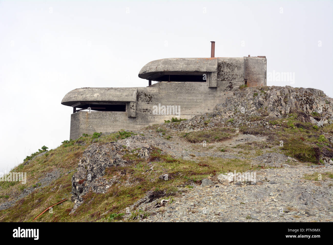 An abandoned World War Two U.S. military bunker and observation point on Bunker Hill, over Dutch Harbor, Unalaska, Aleutian Islands, Alaska, USA. Stock Photo