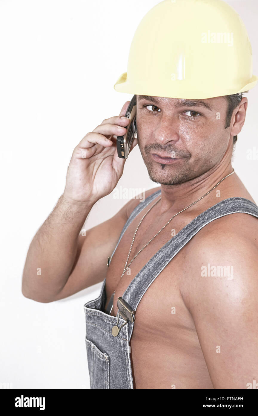Personen Optimistisch Symbolfoto Mann Maenner Telefonieren Telefoniert Handy Mobiltelefon Telefon Heimwerken Heimwerker Handwerker Helm Schutzhelm Bau Stock Photo Alamy