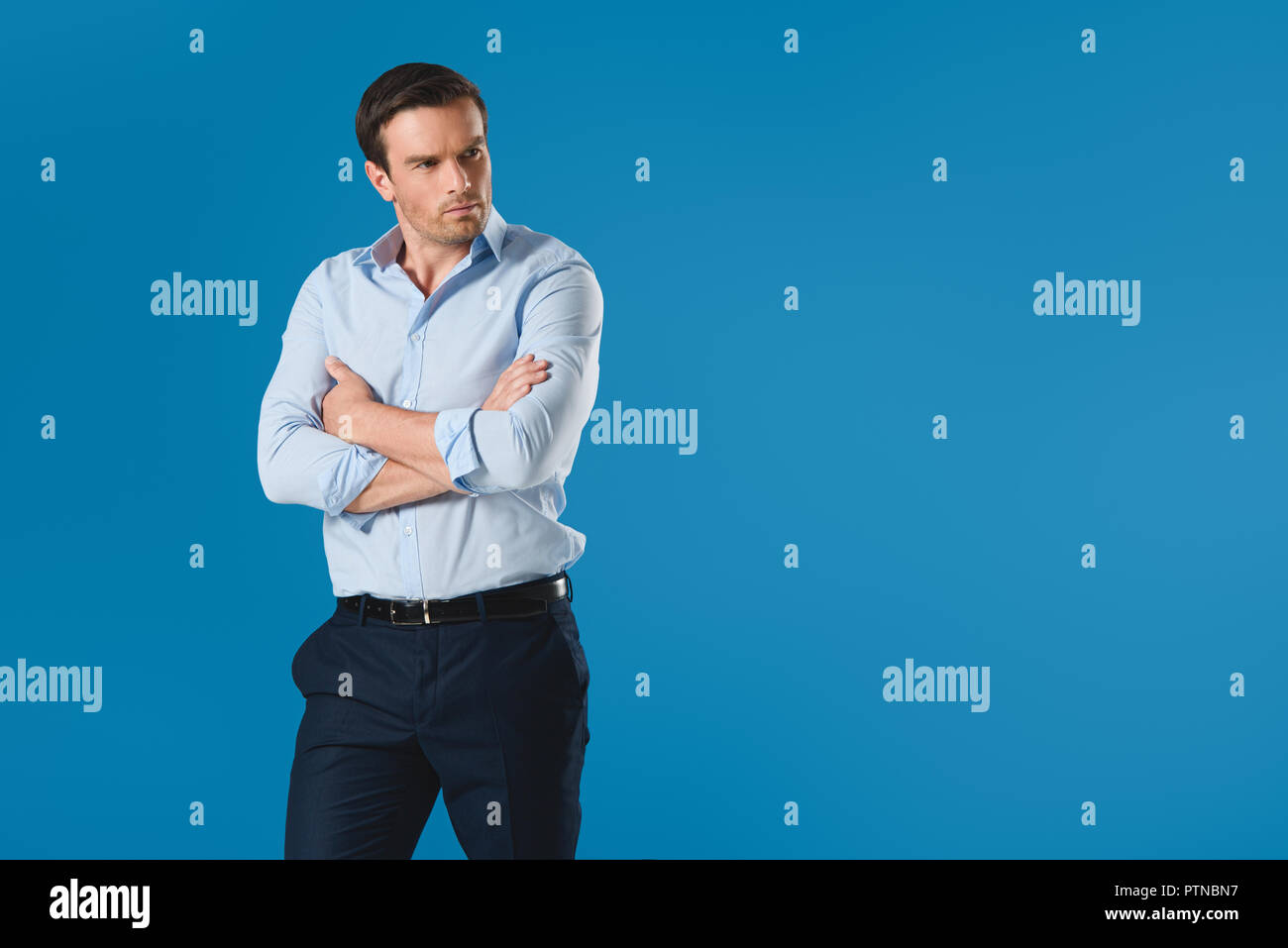 Serious aged man standing hi-res stock photography and images - Alamy