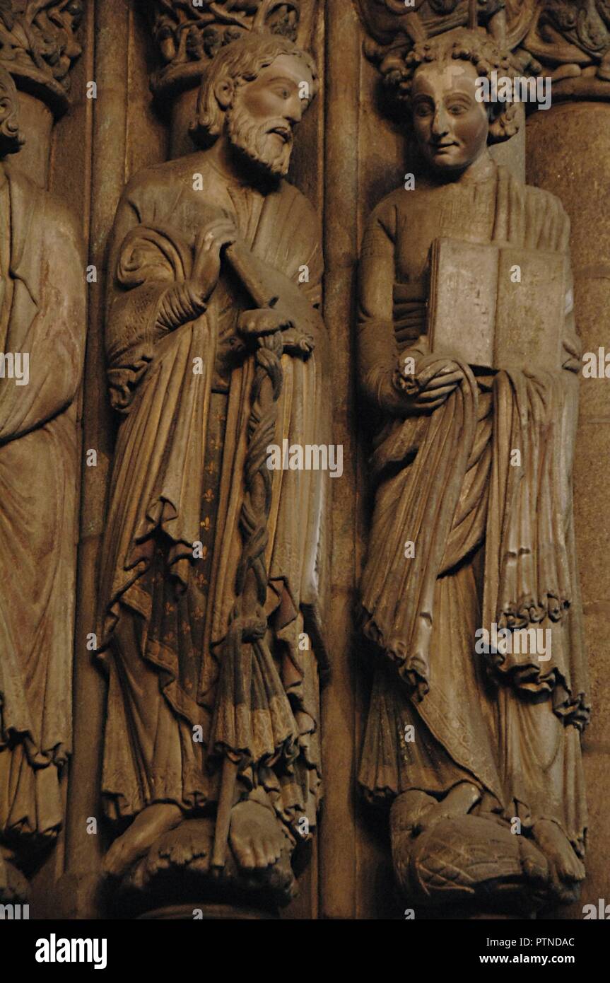 Santiago de Compostela, province of La Coruna, Galicia, Spain. The Cathedral. The Portal of Glory, by Master Mateo, 1168-1188. Left jamb. Four Apostles: detail of James and John the Evangelist (from left to right). Sculptoric detail. Stock Photo