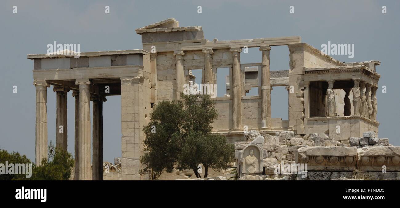 Greece. Athens. Acropolis. Erechtheion. Ionic temple which was built in 421 BC by Athenian architect Mnesicles (Pericles Age). Kariatides (Porch of the Caryatids). General view. Stock Photo