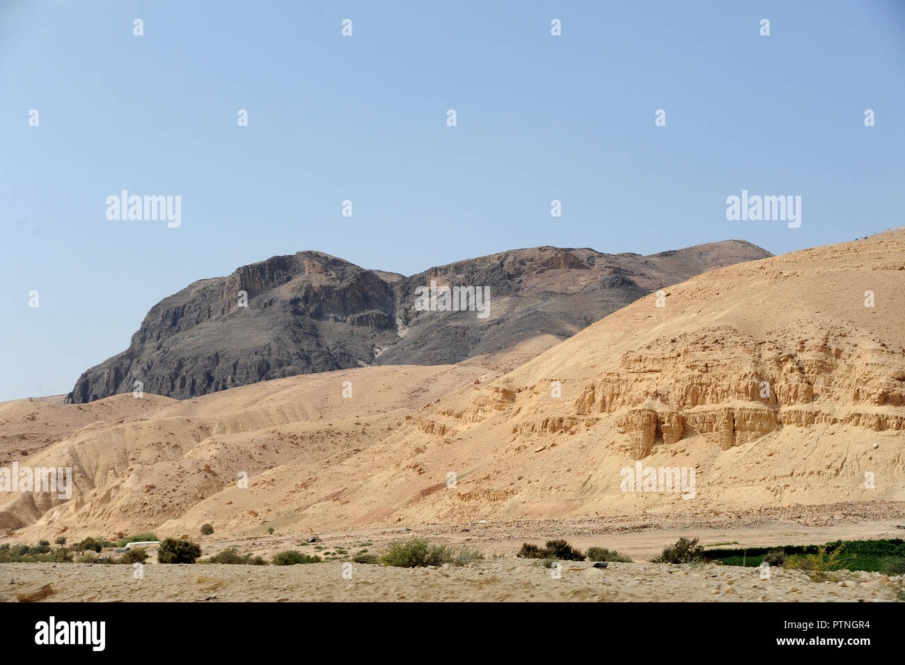 panoramic view from the King's Highway, which swoops over the high ridge of the Great Rift Valley. in Jordan Stock Photo