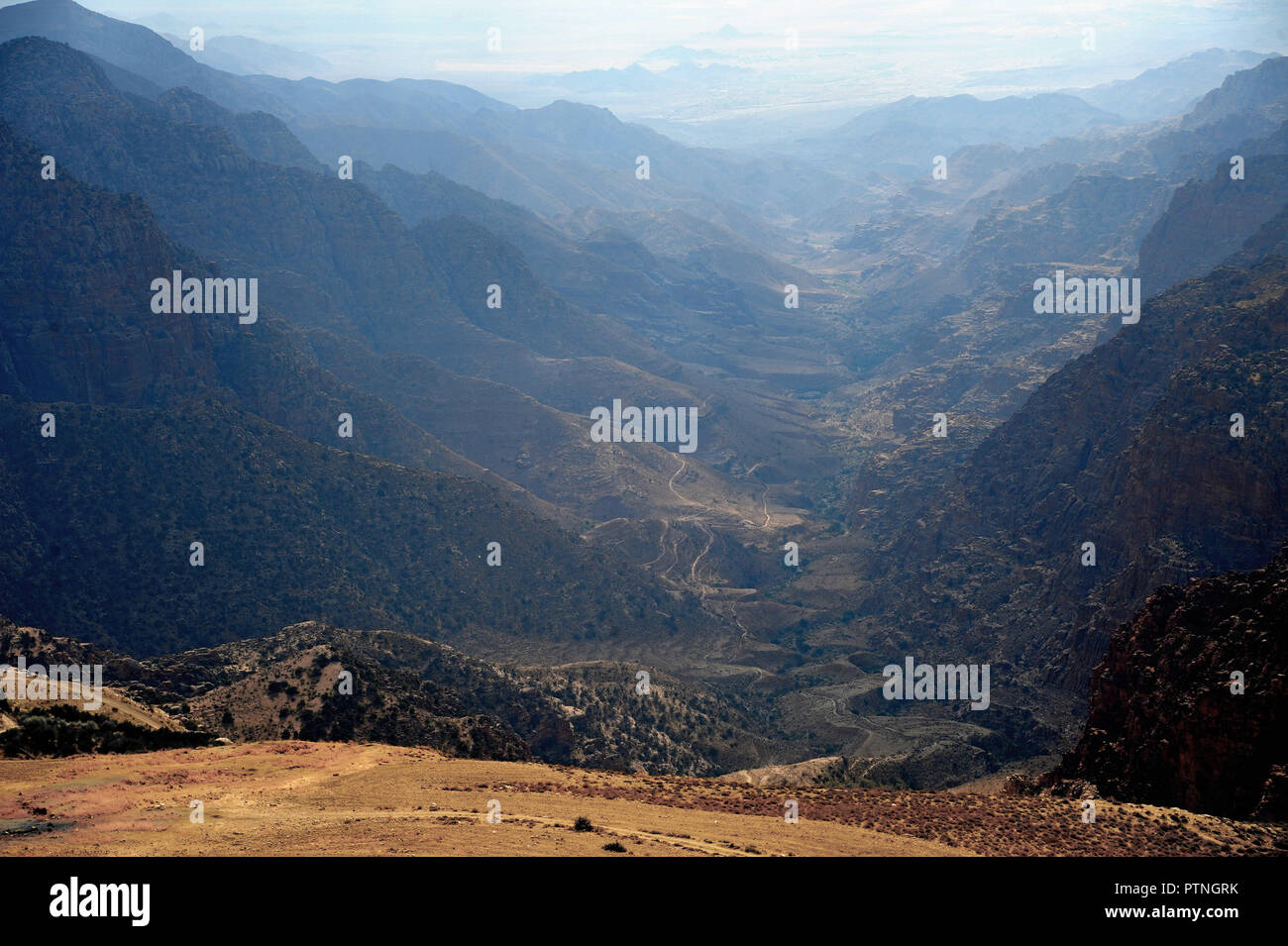 panoramic view from the King's Highway, which swoops over the high ridge of the Great Rift Valley. in Jordan Stock Photo