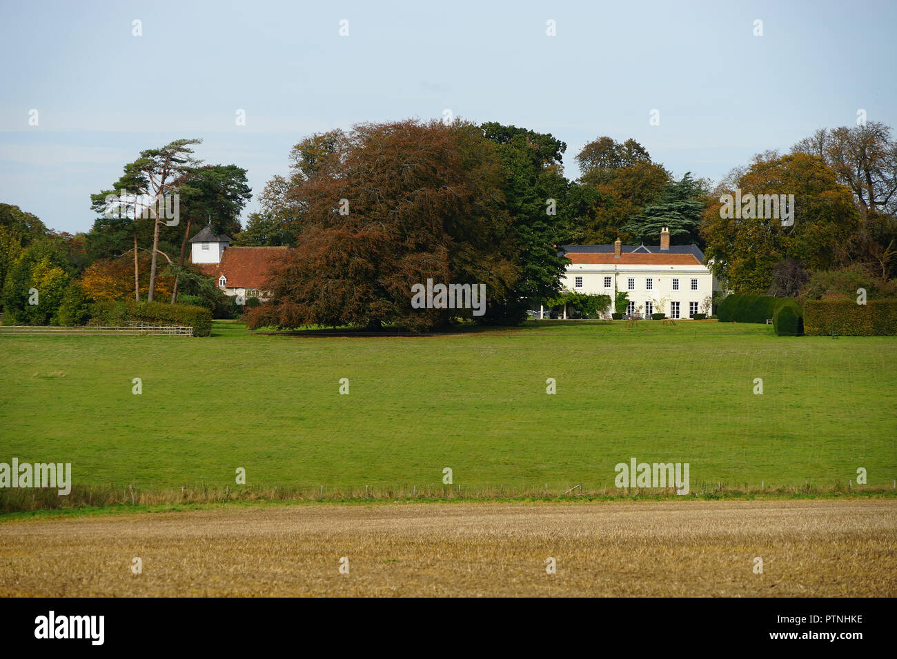 Dummer House and church Stock Photo
