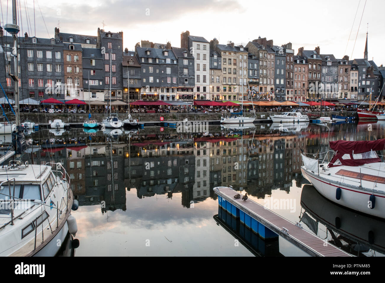 Honfleur harbour at night, Normandy Stock Photo - Alamy