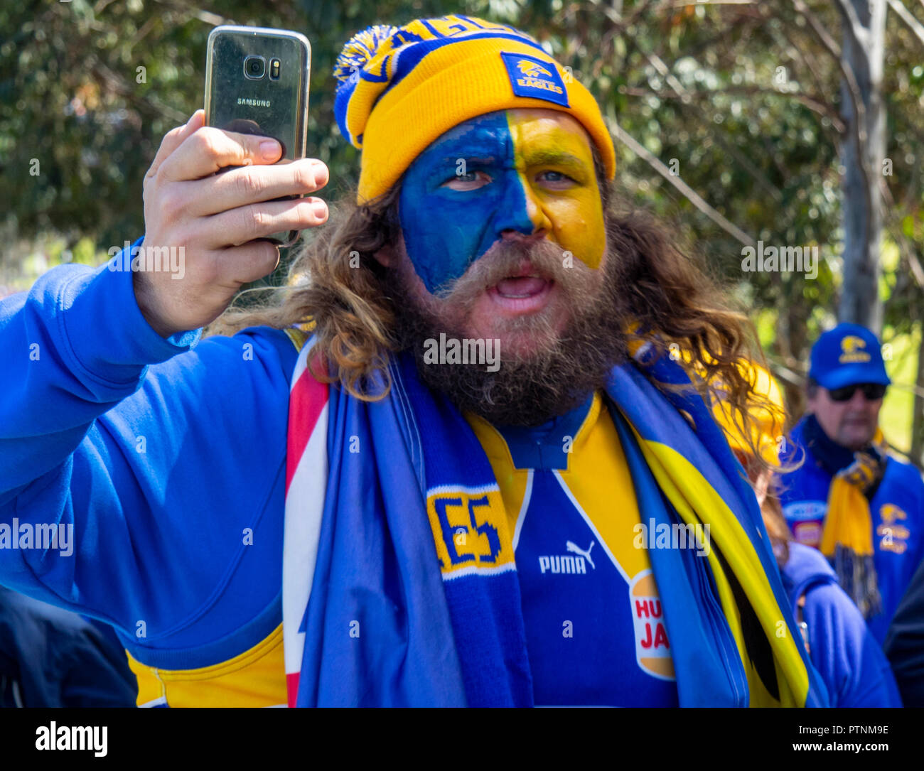 West Coast Eagles Football Club fan and supporter with painted face at 2018  AFL Grand Final at the MCG, Melbourne Victoria Australia Stock Photo - Alamy