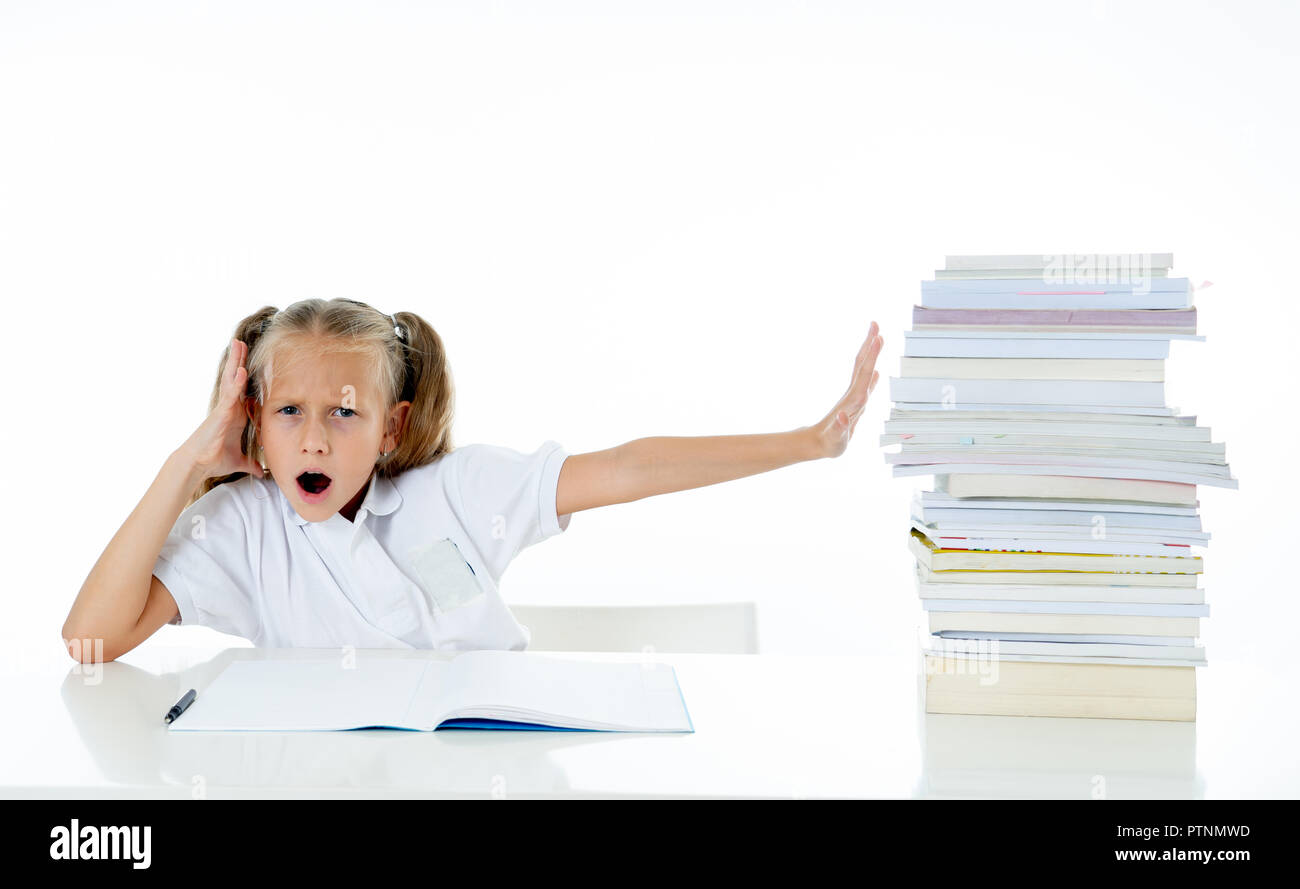 Frustrated little schoolgirl feeling a failure unable to concentrate in