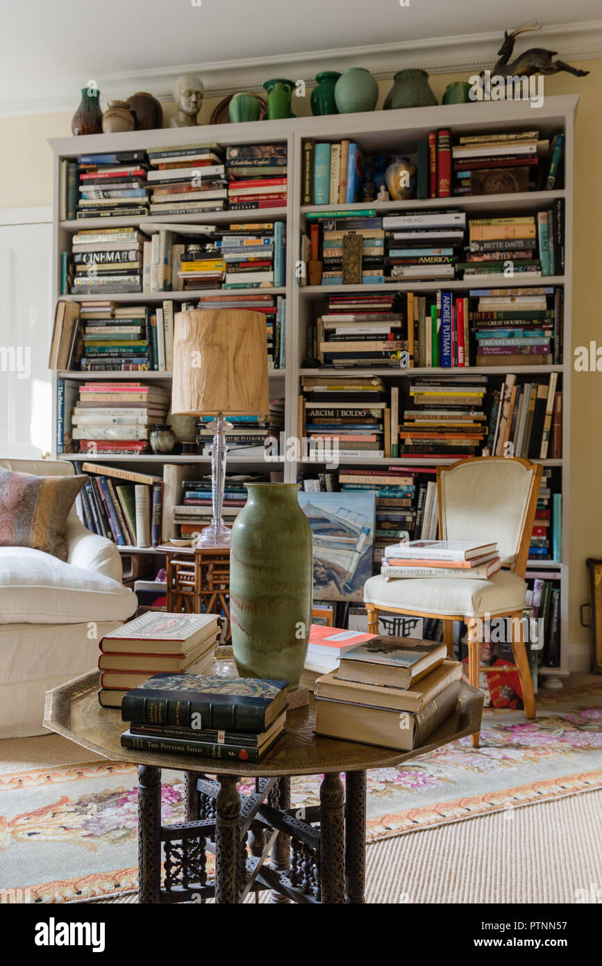 Table lamp on bookshelf online