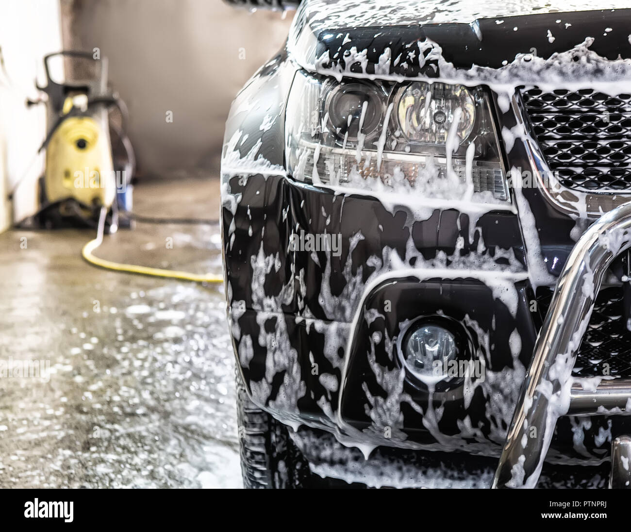car at car wash shampoos Stock Photo