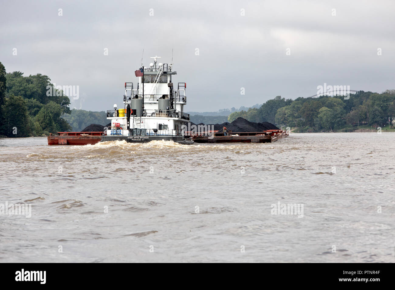 Tugboat 'Mary Artie Brannon, Paducah, KY' pushing coal loaded  barges, Ohio River. Stock Photo