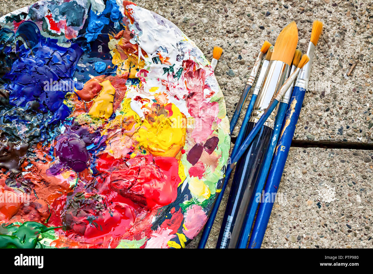 Mixed colors of oil paint on a classical palette Painter's palette