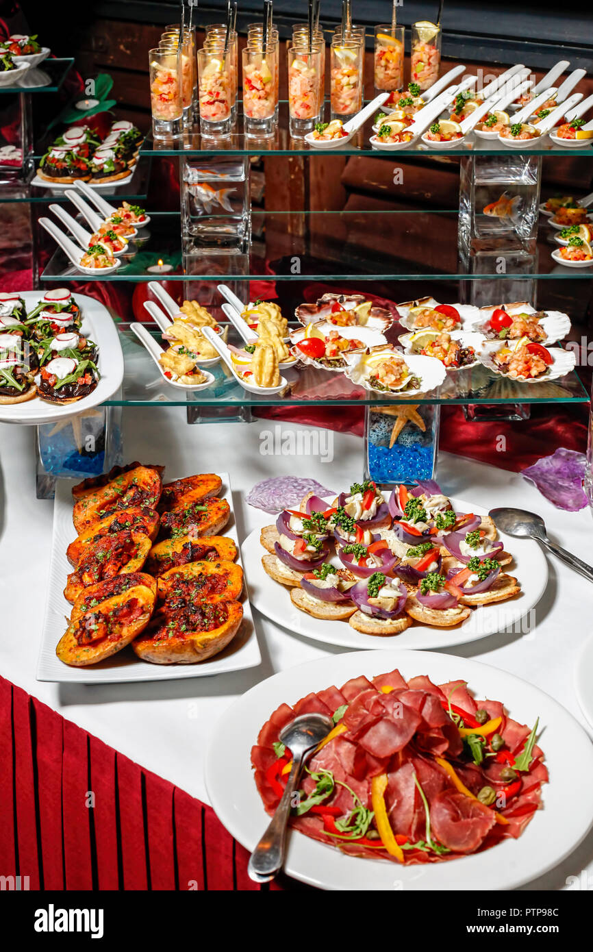 Variety of arranged party finger food - cold buffet Stock Photo
