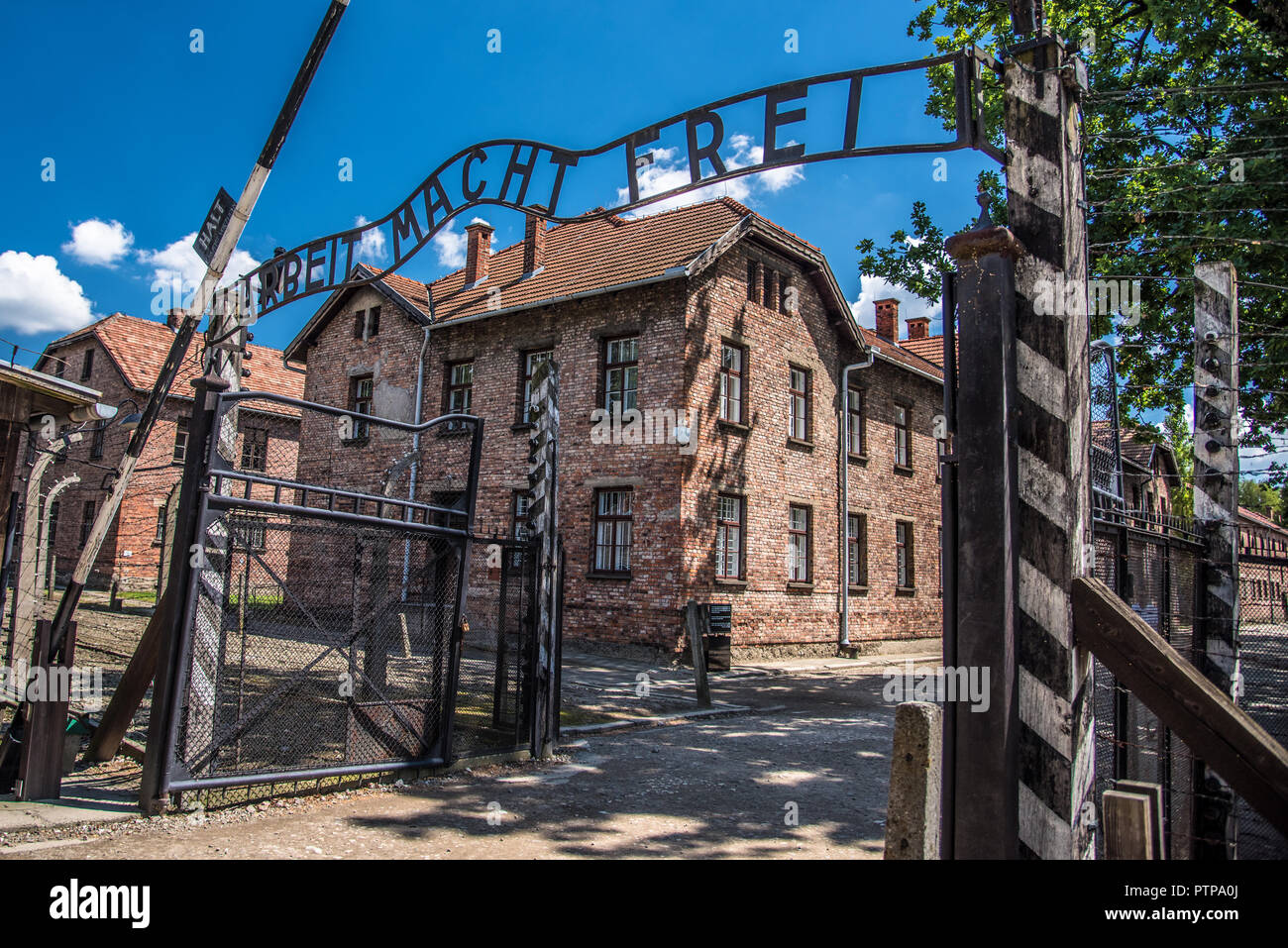 Arbeit macht frei in Auschwitz Poland during the holocaust. Concentration camp in Auschwitz Birkenau controlled by the nazis of the NSDAP in Germany Stock Photo
