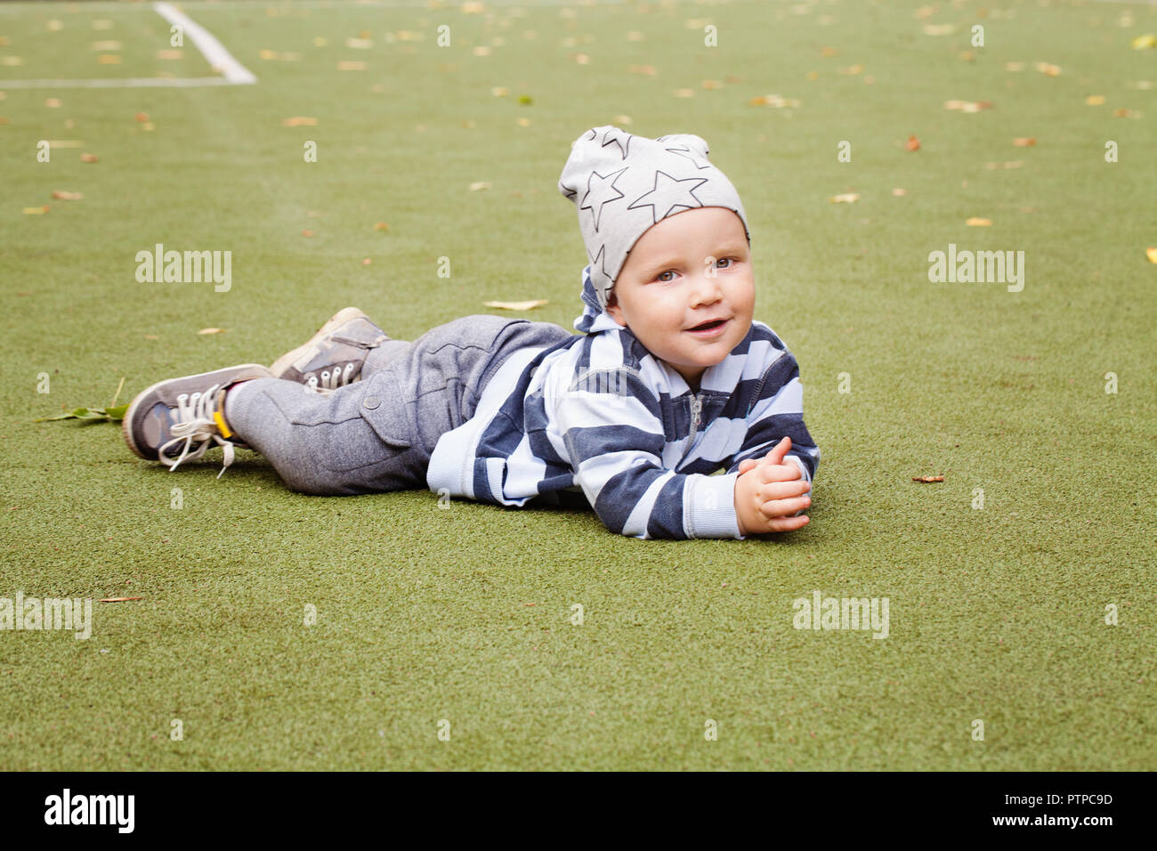 Happy child outdoors, little boy 1-2 years old Stock Photo