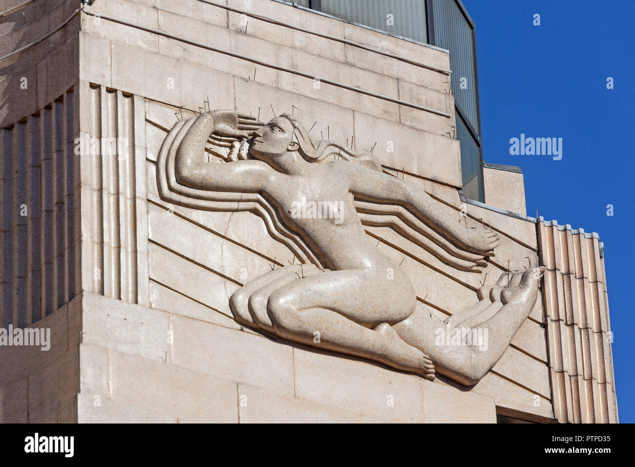 London, Leicester Square   A relief panel depicting the spirit of sight on the former  Art Deco Warner Theatre,  now the Vue West End cinema complex. Stock Photo