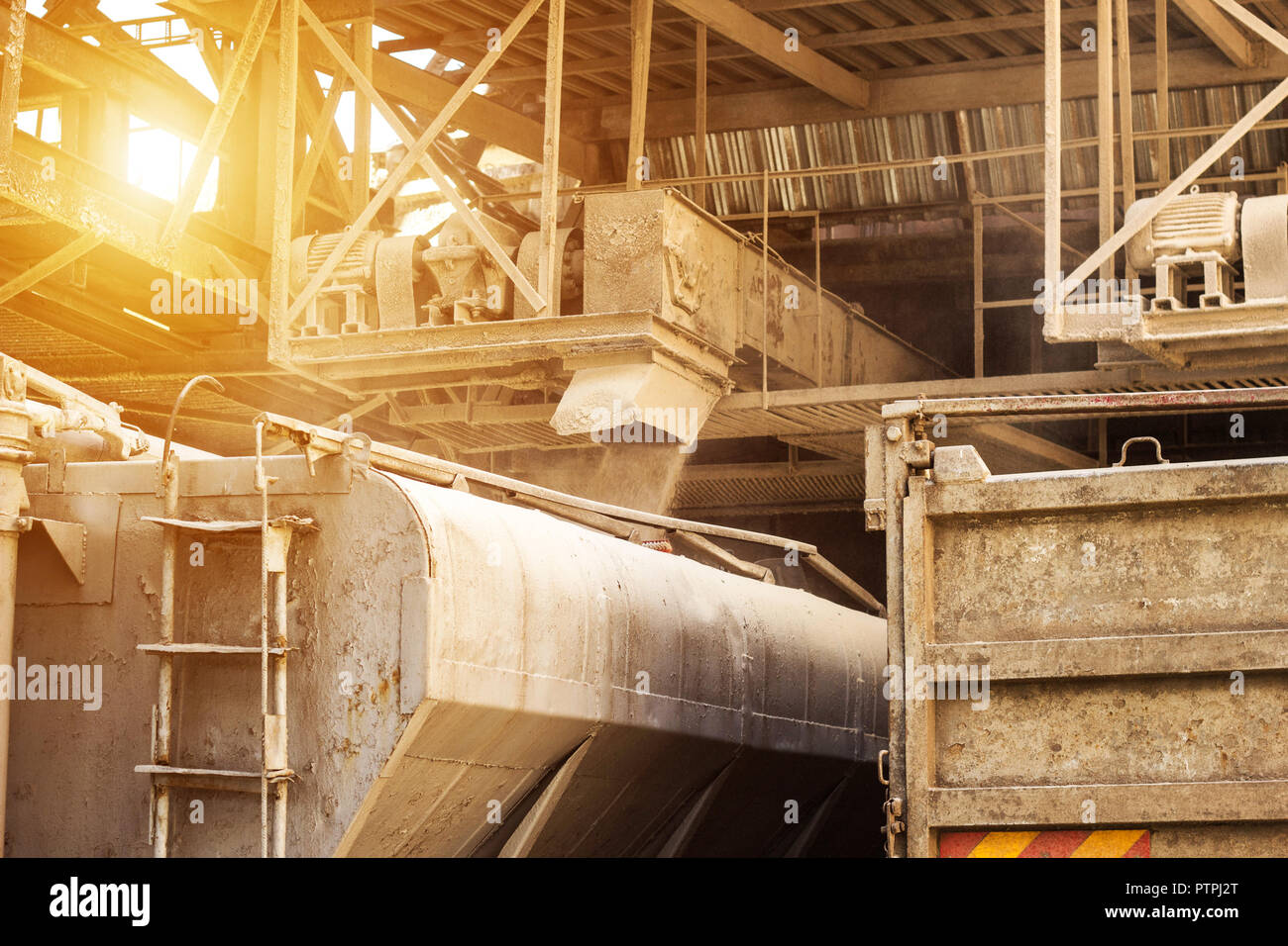 Loading of mixed fodder in a truck for feeding farm animals, a factory ...
