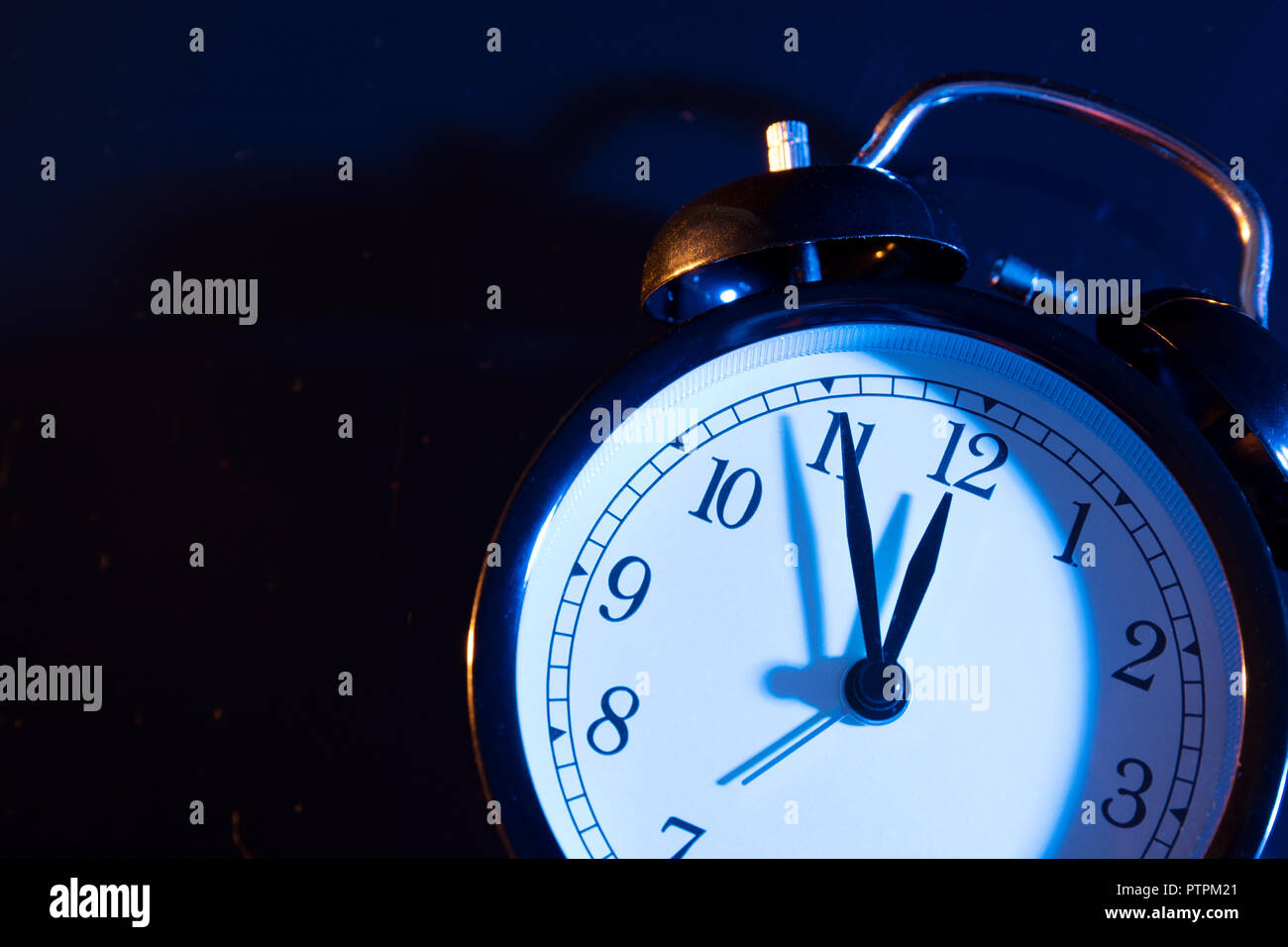 Five minutes to midnight. Changing the clocks, time adjustment