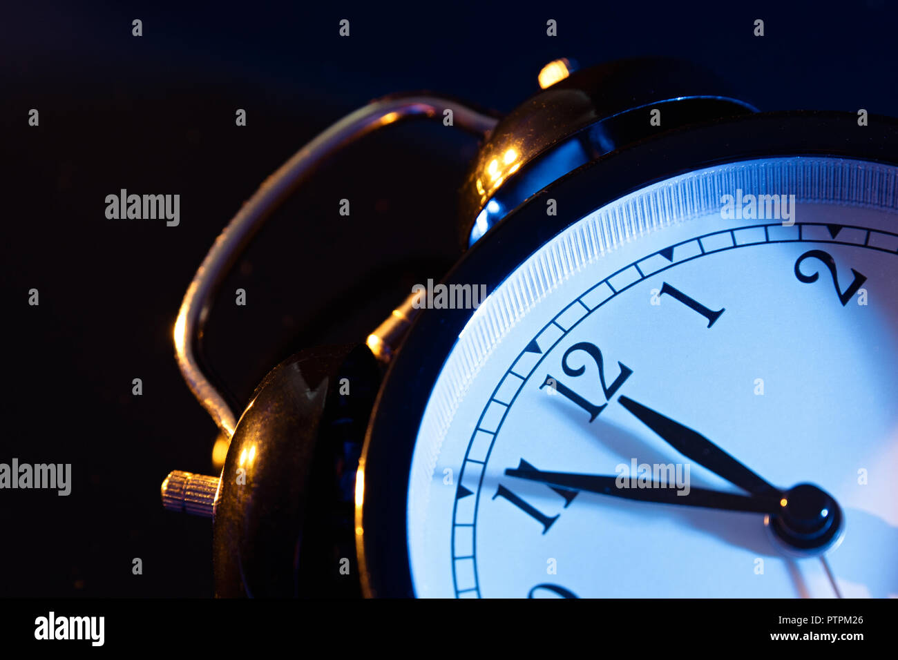 Five minutes to midnight. Changing the clocks, time adjustment