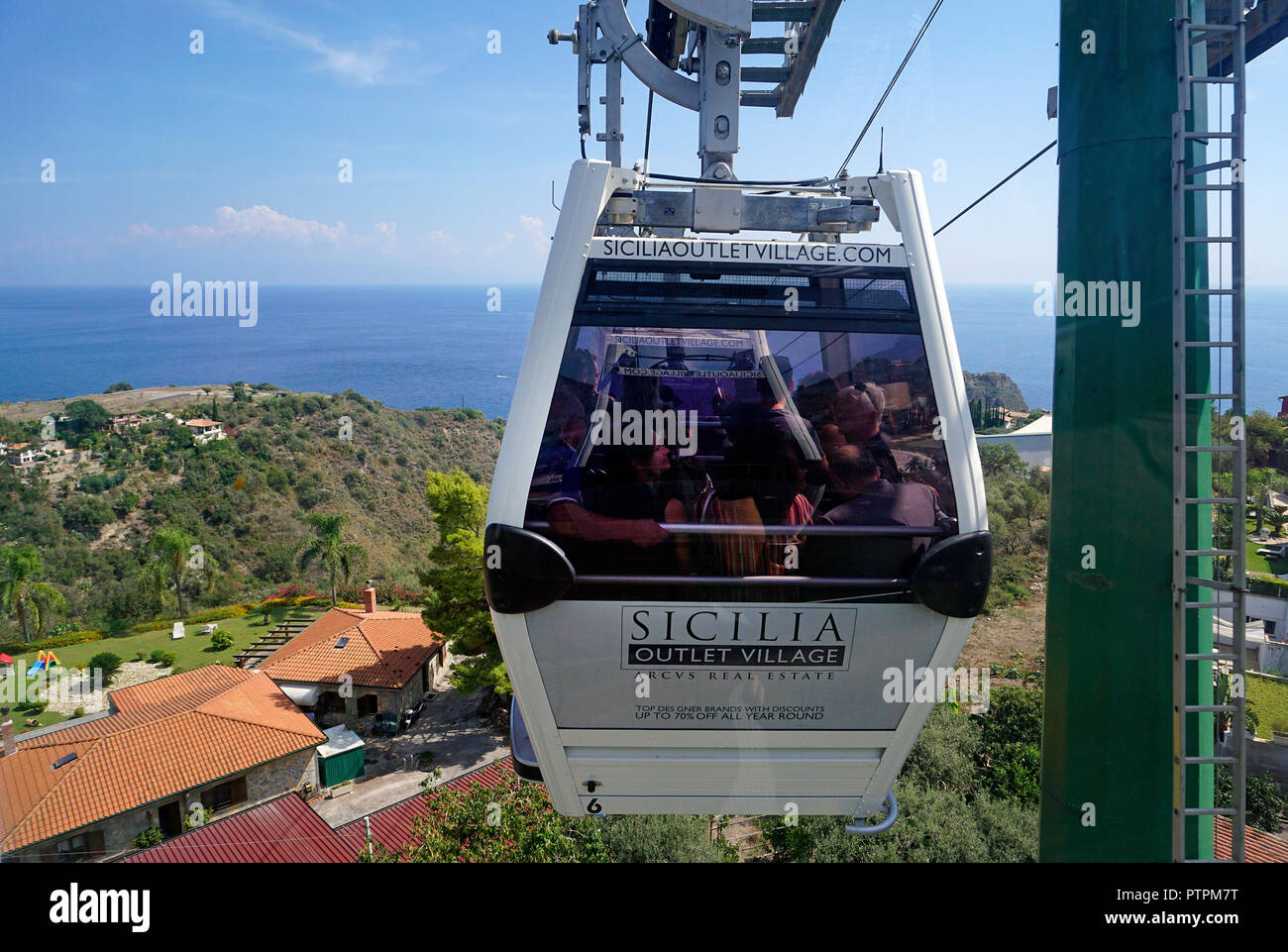 Cable car ride from the old town of Taormina to the beach of Mazzarò, Sicily, Italy Stock Photo